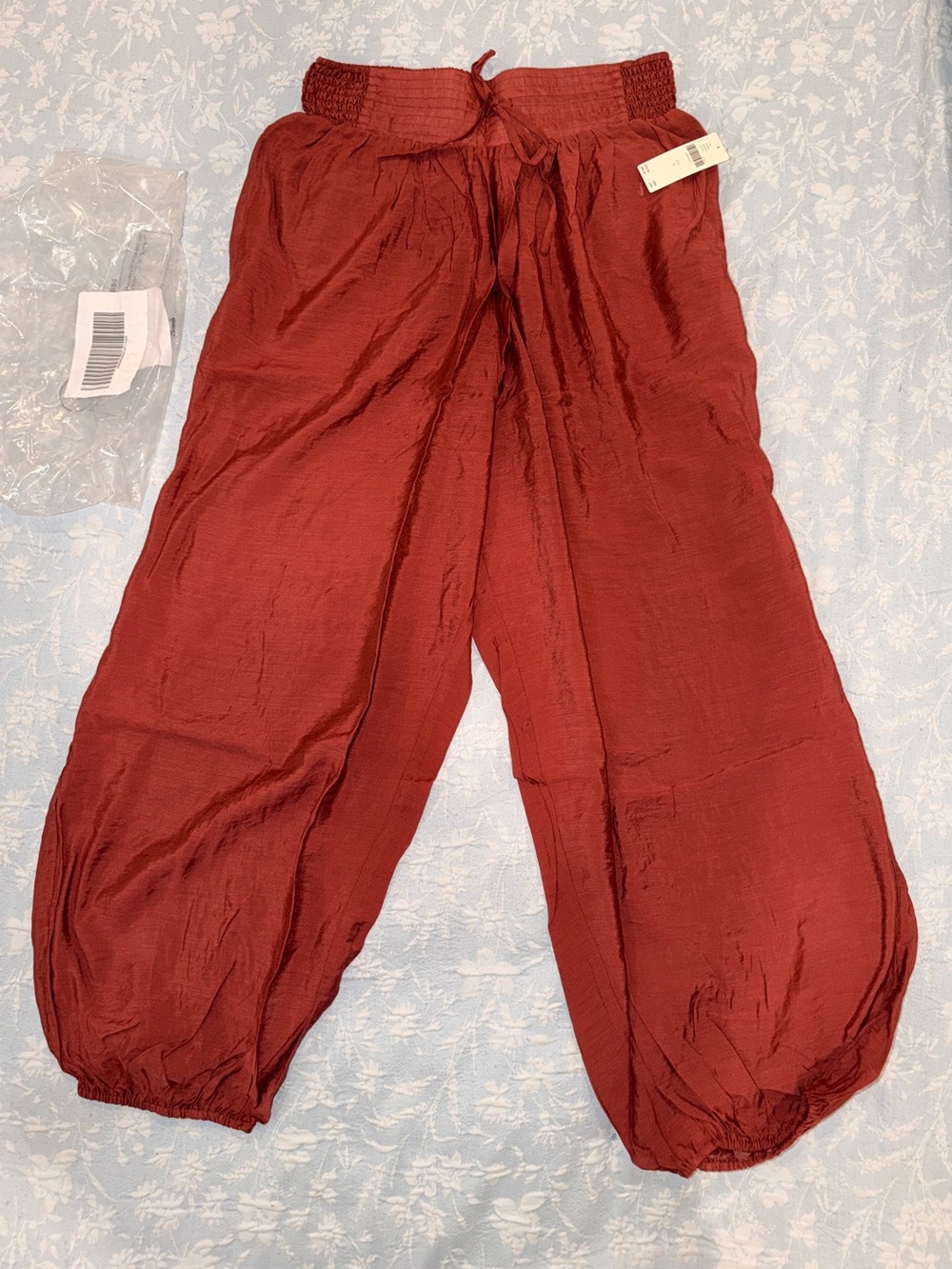 Celandine smocked balloon pants in deep auburn